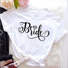 New Bride Shirt. Bought But Never Worn. White Size Small. From A Smoke Free Home. Will Ship Right Away. White Short Sleeve Bride T-shirt, White Casual T-shirt For Bachelorette Party, Cheap White T-shirt For Bachelorette Party, Bride To Be Tshirt Design, Bride Tshirt, White Bride, Bride Shirts, Bella Canvas, Womens Tops