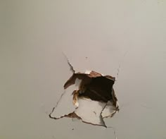 a hole in the wall that has been torn open