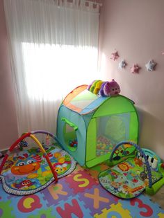 a child's play room with toys on the floor