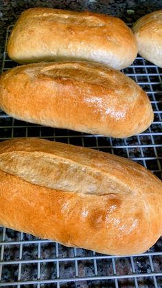 the best super soft and chewy hoagie bread rolls are cooling on a rack