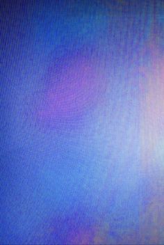 an image of a blurry blue and purple background