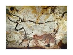 an animal painting on the side of a rock wall with other animals painted on it