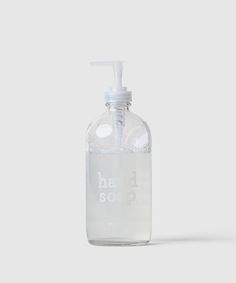 a hand soap dispenser is shown on a white background with the words hand soap printed on it