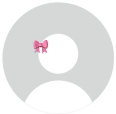 a pink bow on top of a white circle with the letter q in it's center