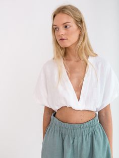 "ISLA is a high waist linen shorts. DETAILS - High waist - Elasticated waist - Side seam pockets - Oeko-Tex certified 100% lightweight linen - Cut and sewn to order just for you in our studio COLOR - Dark turquoise, you can also choose other colors above - Fabric samples are available here https://www.etsy.com/listing/586569696/linen-fabric-samples SIZING & FIT - Fits true to size - Inseam measures 4.92\" / 12.5 cm - Measurements taken from a size S - Model is wearing a size S - Model is 5'8 Wide Leg Linen Trousers, Linen Tunic Dress, Turquoise Fabric, Linen Shirt Dress, Linen Jacket, Handmade Clothing, Linen Trousers, Mini Dresses Summer, Linen Shorts