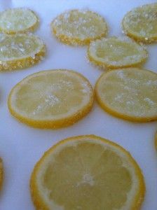 lemons are arranged on a white surface to be used as candies or cookies