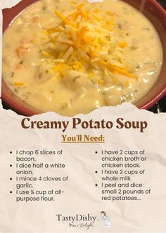 a bowl of creamy potato soup with cheese on top