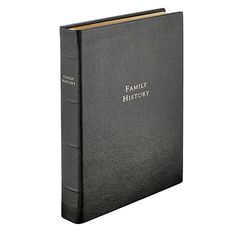 the family history book is black and has gold lettering that reads,'family history '