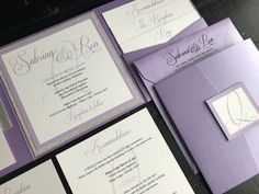 purple and white wedding stationery with matching envelopes