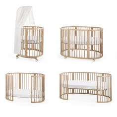 four baby cribs with white sheets on them