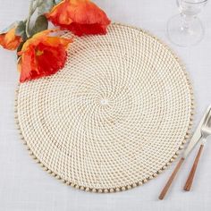 Fennco Styles Handmade Beaded Border Rattan Placemat 15" Round, 1- Piece Bring a natural touch with the Beaded Border Rattan Placemat. It showcases the beautifully handwoven from rattan and finishes with a border of orange beads giving a rustic textured, organic appearance and adding a bit of color to the mix. This natural color table mat coordinates well with any decor, you can use it as a base under vases, ornaments, and small potted plants atop your console table, coffee table, or other flat Rattan Placemat, Color Table, Small Potted Plants, Table Coffee, Colorful Table, Inspired Living, Table Mat, Sustainable Materials, Table Mats