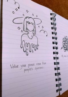 two notebooks with writing on them sitting next to each other, one has an image of a woman's face and the other says value your place more than people's opinions