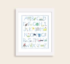 a white framed print with the letters and numbers for children's nursery room decor