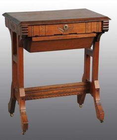 an old wooden desk with drawers on wheels