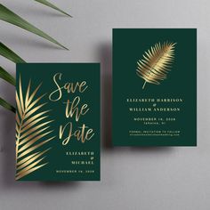 two green and gold foil save the date cards with palm leaves on them, next to a potted plant