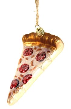 a slice of pizza hanging from a string on a white background with red circles around it