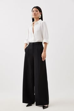 Experience Sleek Tailoring In A Pair Of Wide Leg Trousers, Featuring A Dramatic And Ultra Comfortable Wide Leg Fit And A Comfortable High Waistline. Style It With A Shirt, And Heels For A Dressy Look Perfect For Office Days And Formal Events, Then With A T-Shirt And Trainers For A More Laid Back Approach. Premium Woven Viscose Crepe Wide Leg Trouser High Quality Cepe Fabric Comfortable High Waistline Statement Wide Leg Fit Classic Pleat Detailing Pocket Accents Wide Leg Womens Dress Pants, Wide Leg Pants Cocktail Outfit, Pleated Black Pants Outfit, High Fashion Office Wear, Wide Legged Trousers Outfit, Wide Leg Work Outfit, Commense Clothing, Wide Leg Slacks Outfit, Black Wide Pants Outfit