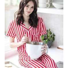 The Hello Mello Holiday Pajama Top for women is crafted with a timeless classic button-down style. This classic button-down pajama top is crafted from signature soft fabric, ensuring a cozy and relaxed fit. It features a convenient front accent pocket and elegant piping detail for a touch of sophistication. Packaged in a matching drawstring pouch, this pajama top makes a delightful gift or a special treat for yourself. Available in sizes S/M, M/L, and L/XL, it’s designed to fit a range of body types comfortably. Choose from a variety of holiday prints that capture the spirit of the winter season. Embrace the holidays with Hello Mello’s delightful and comfortable pajama top. Holiday Pajamas Women, Sleep Tank Top, Candy Cane Reindeer, Beer Socks, Candy Cane Lane, Lounge Shirt, Pouch Packaging, Comfortable Pajamas, Holiday Pajamas