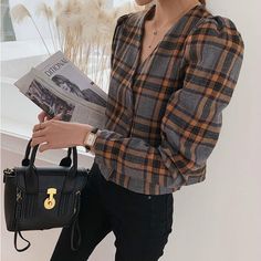 Season: Spring/Autumn Clothing Length: Regular Collar: V-Neck Gender: WOMEN Decoration: Button Material: Polyester, Cotton Sleeve Length(cm): Full Sleeve Style: Regular Style: Vintage Fabric Type: Broadcloth Pattern Type: Plaid Size: S,M,L,XL,2XL,3XL Size (cm) Bust Waist Length Sleeve Length Shoulder S 90 84 57 44 38 M 92 86 58 45 39 L 98 92 59 46 40 XL 104 98 60 47 41 XXL 110 104 61 48 42 XXXL 116 110 62 49 43 Size (inch) Bust Waist Length Sleeve Length Shoulder S 35.43 33.07 22.44 17.32 14.96 Fall V-neck Blouse With Buttons, V-neck Top For Office In Winter, Plaid V-neck Tops For Fall, V-neck Top With Button Closure For Fall, Trendy V-neck Blouse For Fall, V-neck Buttoned Blouse For Fall, V-neck Office Top For Winter, V-neck Top For Office Wear In Winter, Winter V-neck Office Top