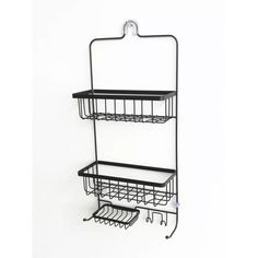 two tiered metal shelf with hooks on each side and one hanging from the wall