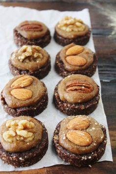 chocolate cookies with nuts and pecans on top