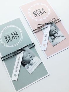 two folded cards with the words noa and an image of a baby's head