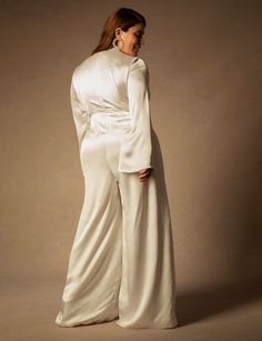 Bridal by ELOQUII Flare Sleeve Jumpsuit | Women's Plus Size Dresses | ELOQUII Tailored Wedding Suit, Women Suits Wedding, Bridal Styles, Bridal Jumpsuit, Silk Jumpsuit, Wedding Jumpsuit, Plus Size Jumpsuit, White Jumpsuit, Jumpsuit With Sleeves