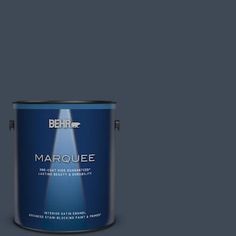 the behr marquee paint is shown in brown and has a dark purple tint