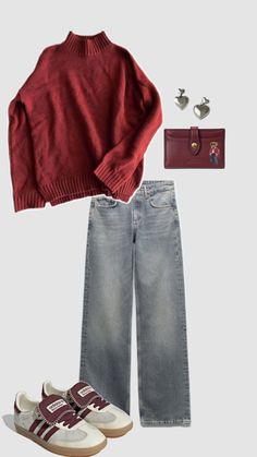 a red sweater, jeans and shoes are on display