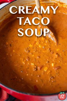 creamy taco soup in a red pot with a wooden spoon on the side and text overlay that reads, creamy taco soup