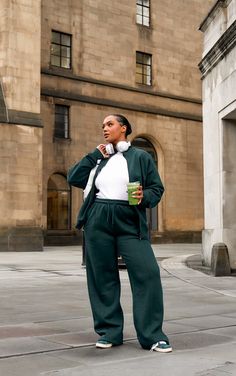 Say hello to your new season staple with this plus forest green seam detail zip through oversized track top. Brought to you in a forest green material with a seam detail and a zip through fastening, what more could you want This oversized track top is here to banish any of your what to wear dilemmas. Style with a basic tee, the matching bottoms and your fave trainers for a look that make you the topic of everyone's conversation.   Length approx 70cm/27.5 (Based on a sample size UK 16)   Model wears size UK 16/ EU 44/ AUS 16/ US 12 Green Trainers Outfit, Trainers Outfit, Green Trainers, Flattering Tops, Green Material, Daily Dress, Basic Tee, Plus Size Shirts, Clothing Co