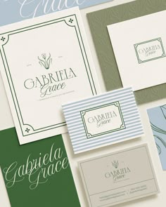 various business cards and stationery designed to look like art deco