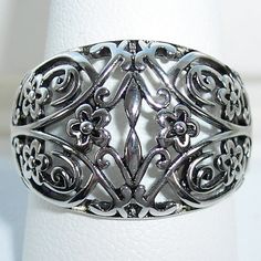 Size 8 Only. Nwot Sterling Silver Ring,. This Beautiful Women's Dome Fashion Ring Is An Open Work Floral Design. It's 16.3 (Mm) Wide, Is Stamped 925 And Has A Rhodium Finish For Greater Shine And Durability. Comes From A Smoke Free Home. Silver Filigree Open Ring, Antique Silver Nickel-free Rings, Formal Stamped 925 Silver Flower Ring, Elegant Nickel-free Flower Ring, Nickel Free Silver Flower Ring, Tanzanite Diamond Ring, Pink Tourmaline Ring, Dome Ring, Rings Jewelry Fashion