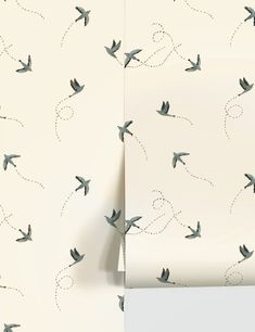 two wallpapers with birds flying in the air and on top of each other