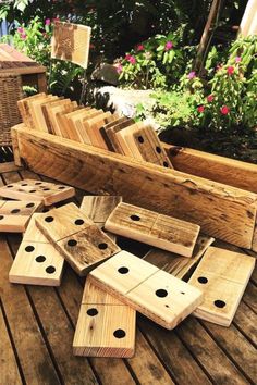 several pieces of wood sitting on top of a wooden deck