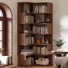 a living room with a large book shelf filled with books