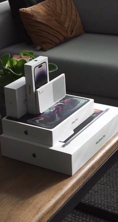 an apple product is sitting on top of two boxes