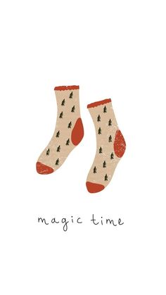 two socks with christmas trees on them and the words magic time written in black ink