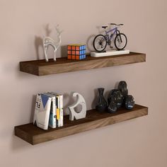 two wooden shelves with books and toys on them