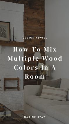 a living room with white brick walls and wood trimming on the fireplace mantel