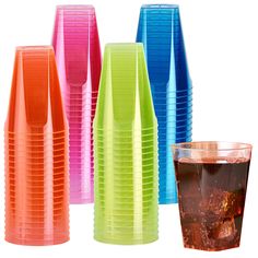 there are many different colored cups next to each other