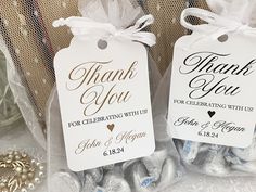 two bags filled with candy sitting on top of a table