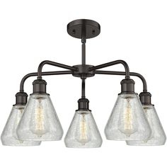 three light chandelier with clear glass shades on the bottom and black metal frame