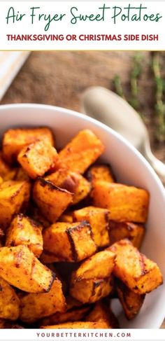 air fryer sweet potatoes in a white bowl with text overlay that says air fryer sweet potatoes thanksgiving or christmas side dish