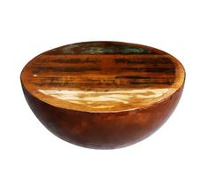 a wooden bowl sitting on top of a white table