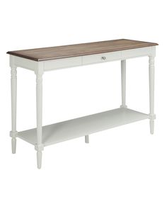 a white and wood table with drawers on the bottom, in front of a white background