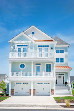 a large white house with two story windows