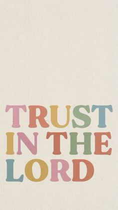 the words trust in the lord are multicolored