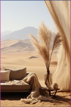 a living room with a couch, coffee table and large drapes in the background