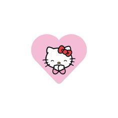 a pink heart with a hello kitty face on the front and bottom corner, as well as a bow in the middle